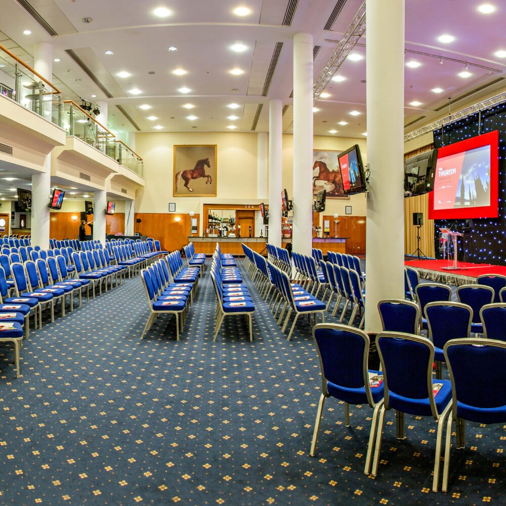 conference chairs and stage at York Racecourse