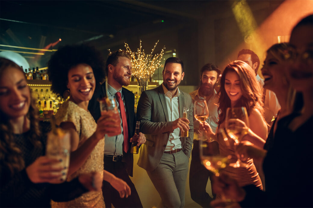 a workplace that has succeeded in planning a christmas party celebrating with drinks at the bar