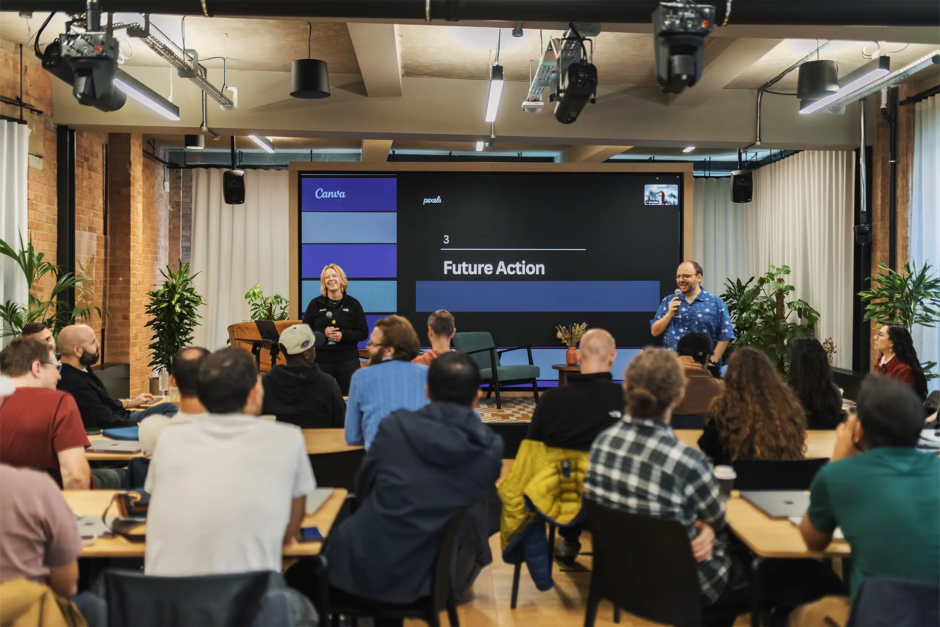 a speaker session from Canva at a well branded conference
